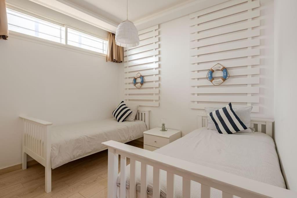 Holiday home Beachfront Escape - Panoramic View And Spacious Terrace